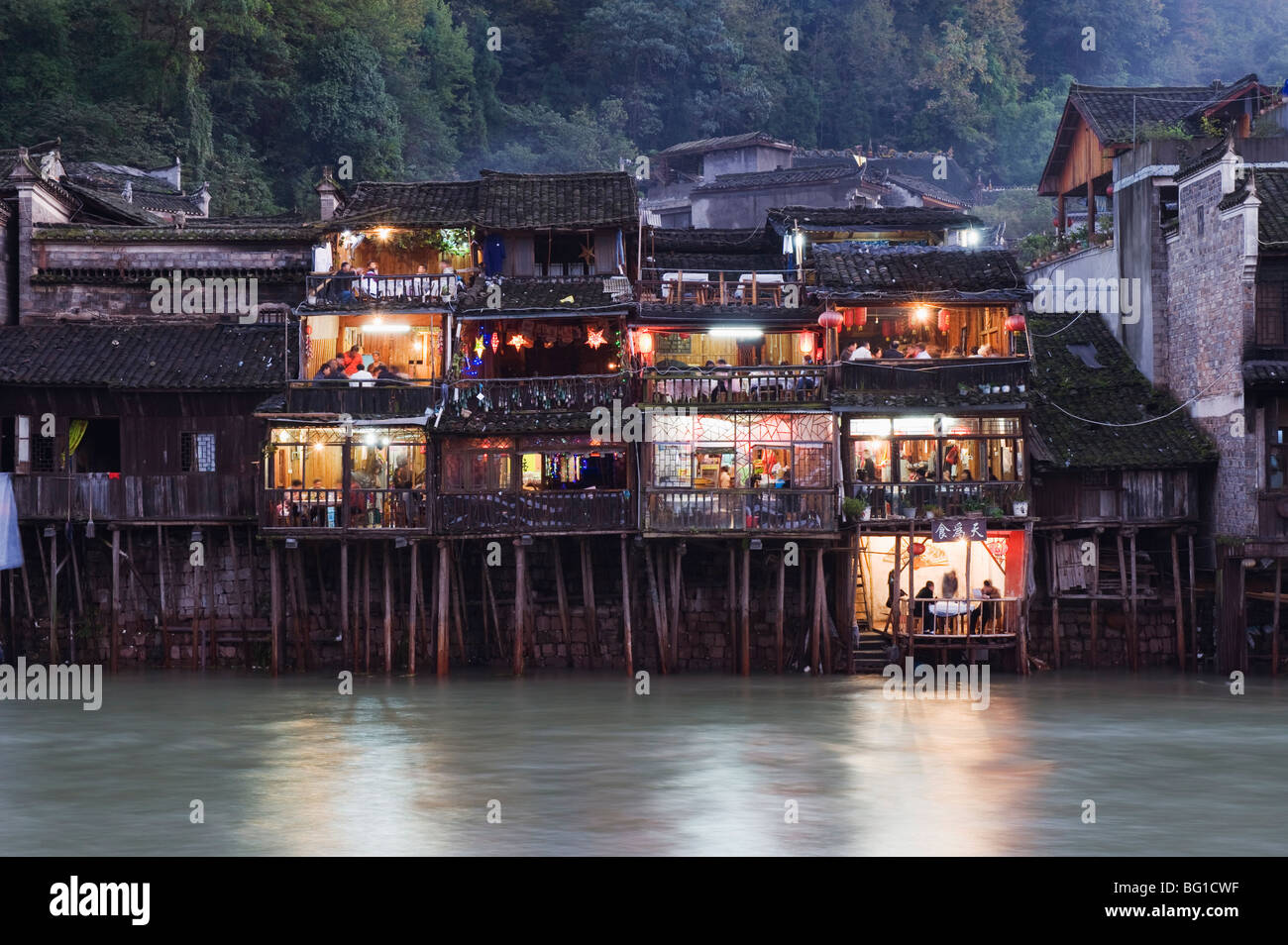 Wooden stilt houses on riverside, old town of Fenghuang, Hunan Province