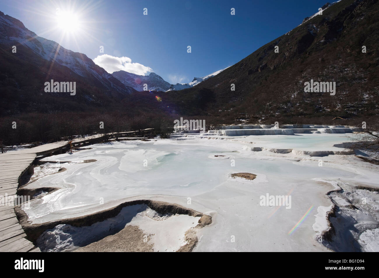 Colourful pools of calcite deposit frozen at Huanglong National Park, UNESCO World Heritage Site, Sichuan Province, China, Asia Stock Photo
