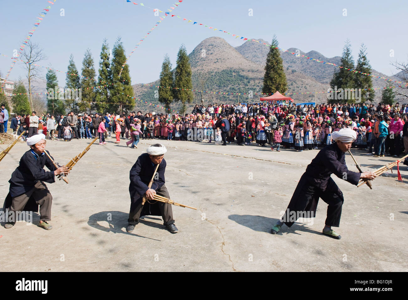 Men playing the lusheng at a 4 Seals Miao lunar New Year festival, Xinyao village, Guizhou Province, China, Asia Stock Photo