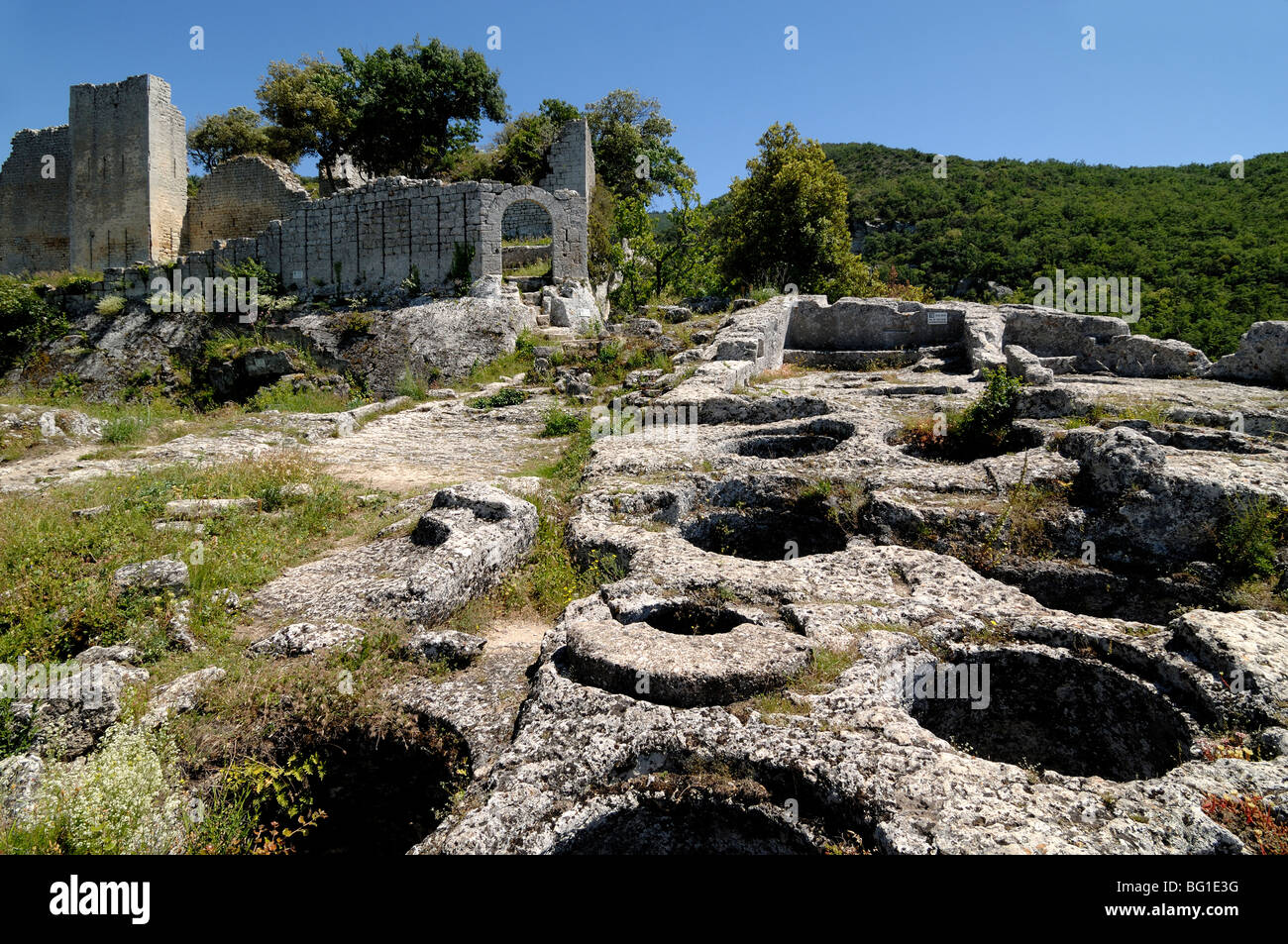Buoux Fort or Fortress Entrance with Rock-Cut Protohistoric Storage Silos or Jars, Luberon, Vaucluse, Provence, France Stock Photo
