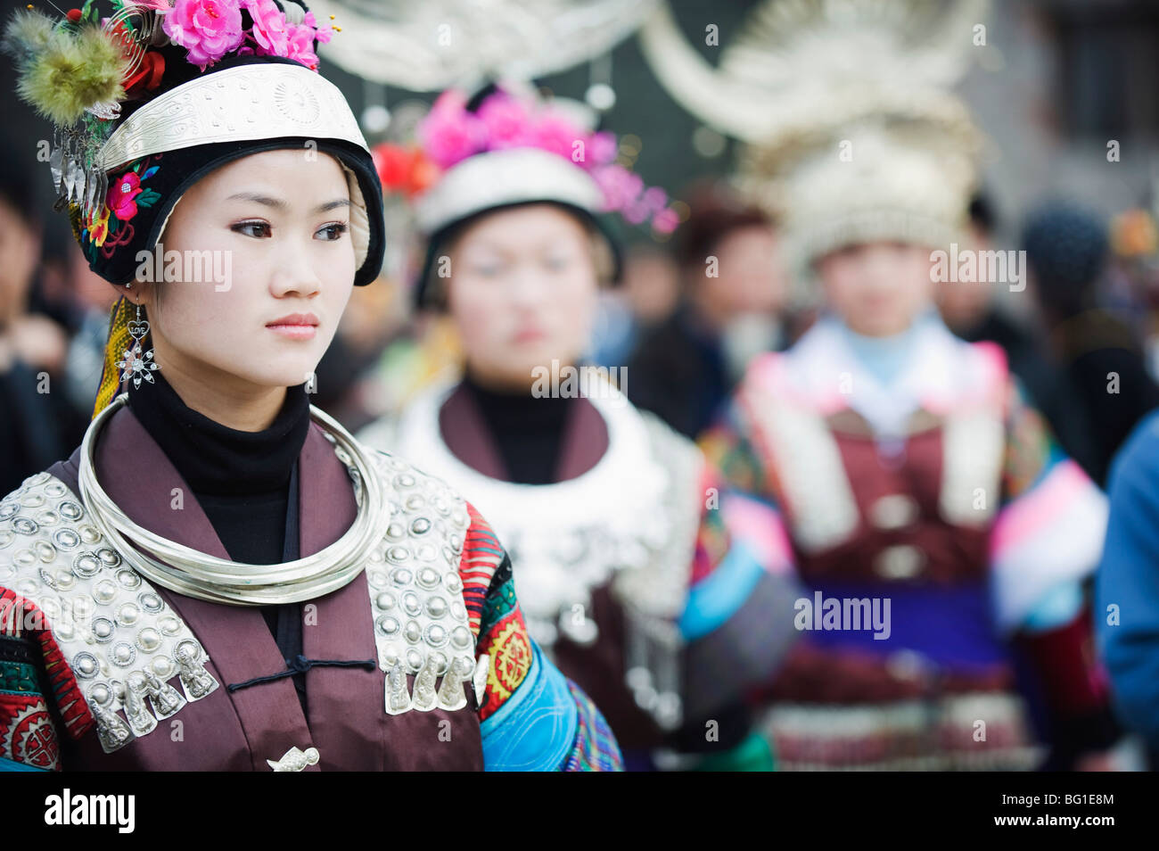 Women in ethnic costume at a Lunar New Year festival in the Miao village of Qingman, Guizhou Province, China, Asia Stock Photo