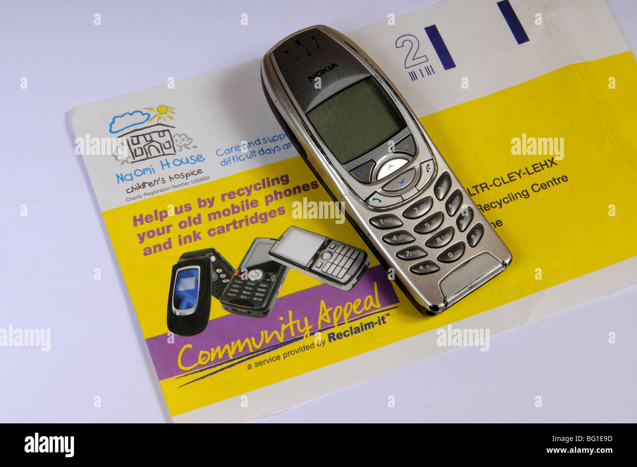 Recycling old mobile phones for charity envelope Stock Photo Alamy