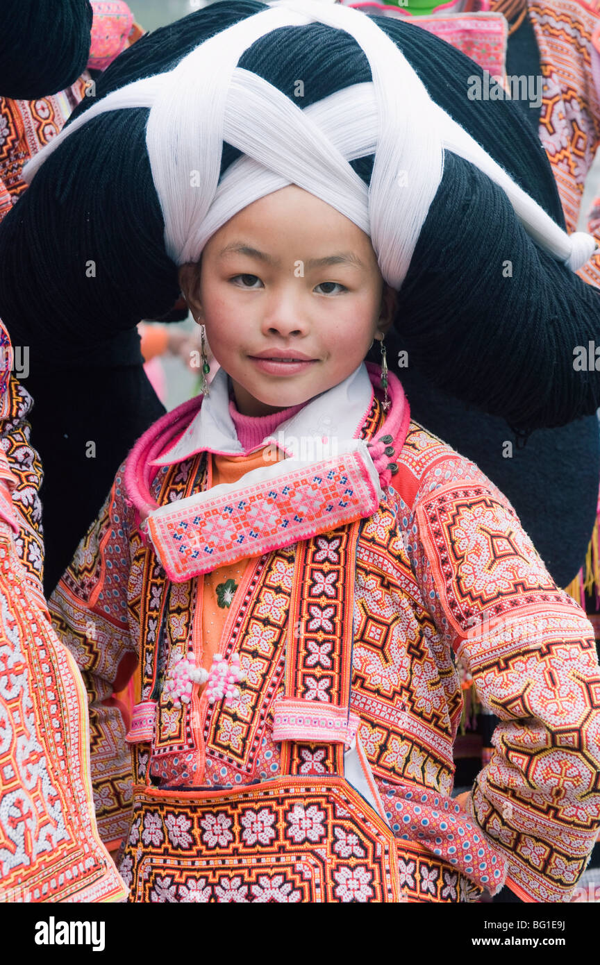 Long Horn Miao girl at lunar New Year festival celebrations in Sugao ethnic village, Guizhou Province, China, Asia Stock Photo