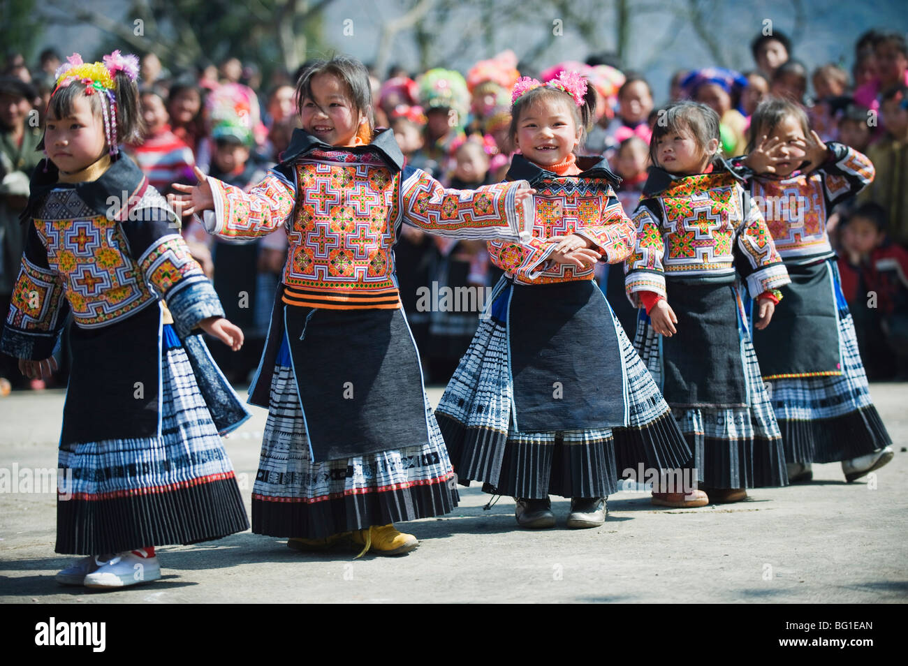 Girls in ethnic costume at a 4 Seals Miao lunar New Year festival, Xinyao village, Guizhou Province, China, Asia Stock Photo