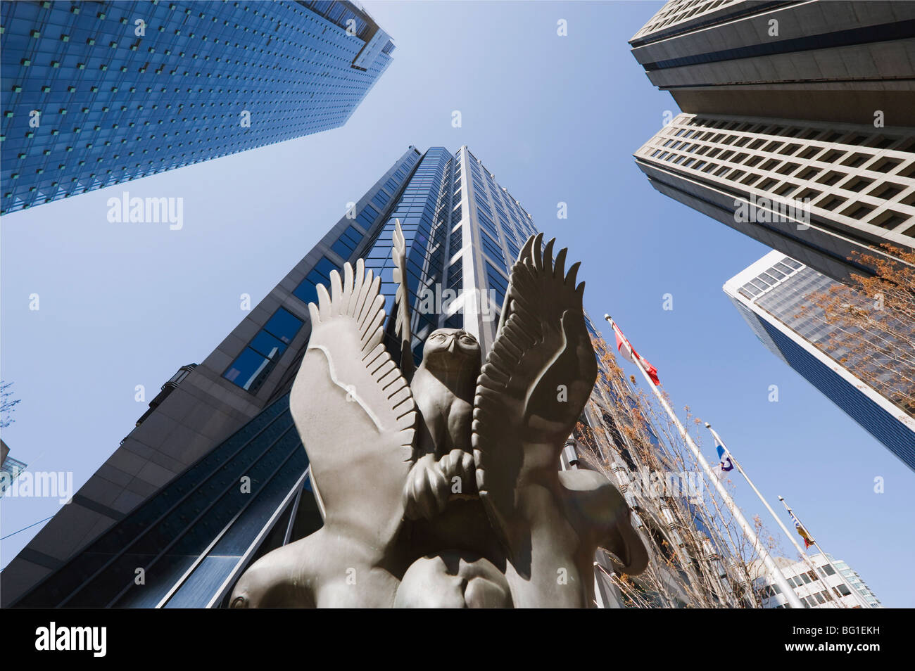 First Nation aboriginal art sculpture and downtown buildings, Vancouver, British Columbia, Canada, North America Stock Photo