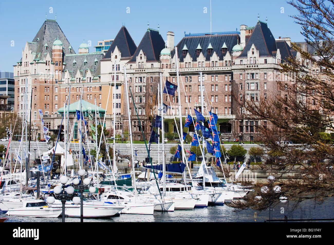 Boats in front of the Fairmont Empress Hotel, James Bay Inner Harbour, Victoria, Vancouver Island, British Columbia, Canada Stock Photo