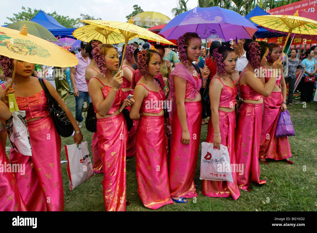 Dai girls at festival, Xishuangbanna, Yunnan, China Stock Photo