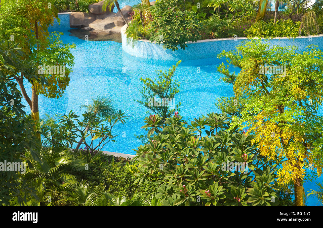 Swimming pool and trees in the garden in a new Chinese residential district Stock Photo