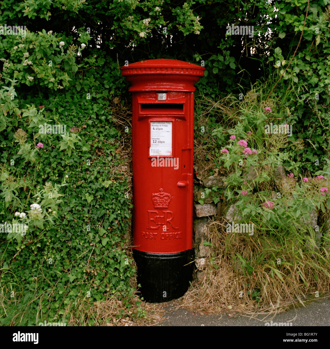 A traditional British Post Box in England in Great Britain in the United Kingdom UK. Postal Service Royal Mail Stock Photo