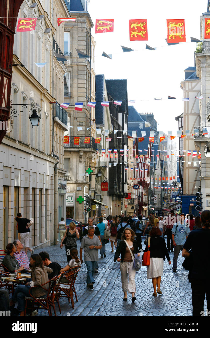 People walking along the Rue du Gros Horloge, the main street of old Rouen, Normandy, France, Europe Stock Photo