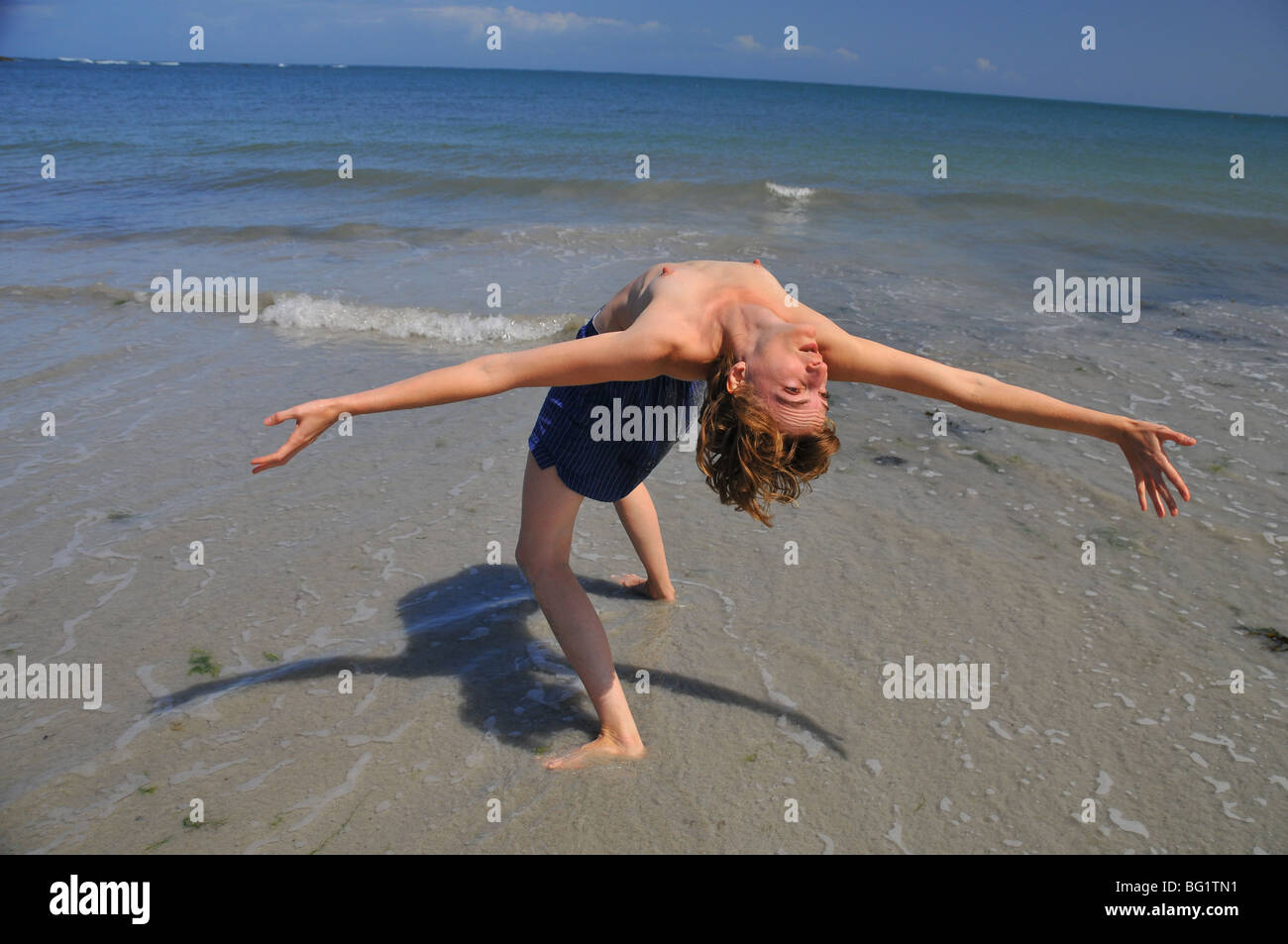 young white woman leaning back with bare breasted on the sand at the beach  Stock Photo - Alamy