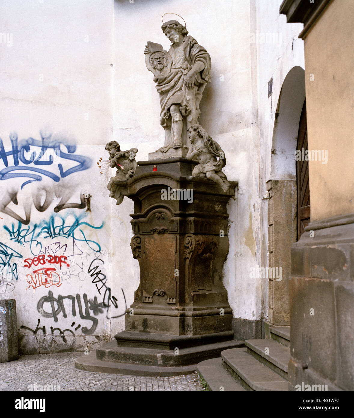 World Travel. Christian religion and graffiti in ancient city of Prague in the Czech Republic in Eastern Europe. Culture History Traveller Wanderlust Stock Photo