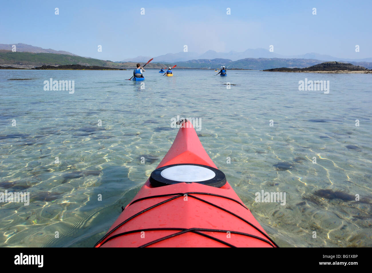 Sea kayaking near Arisaig, Highlands, Scotland, United Kingdom, Europe