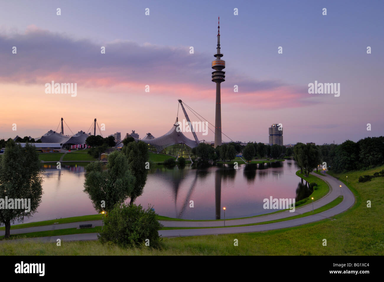 Olympiapark and Olympiaturm (TV tower) at dusk, Munich (Munchen), Bavaria, Germany, Europe Stock Photo