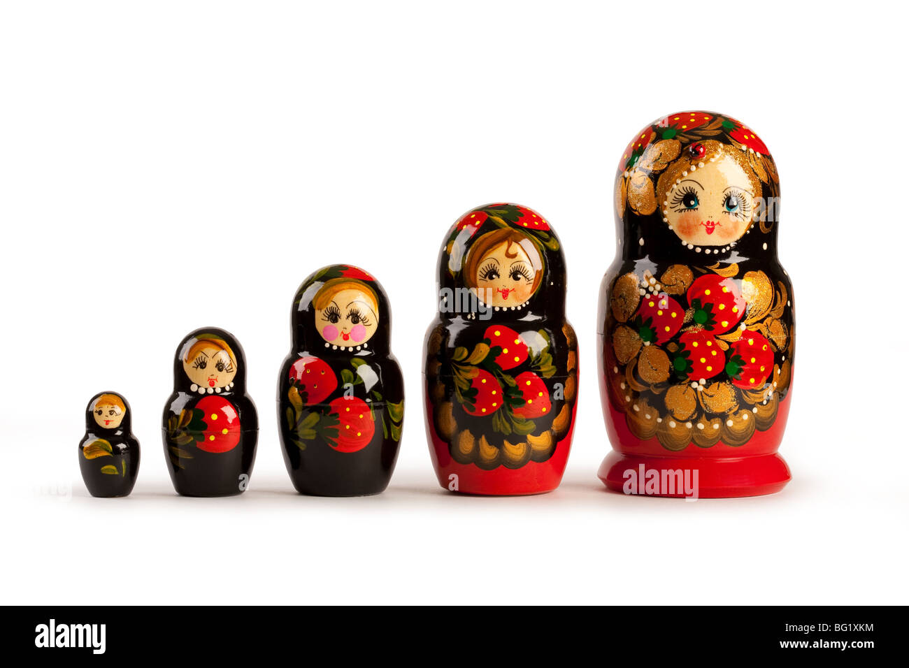 Russian doll - matreshka. All dolls can be gathered inside big one. Stock Photo