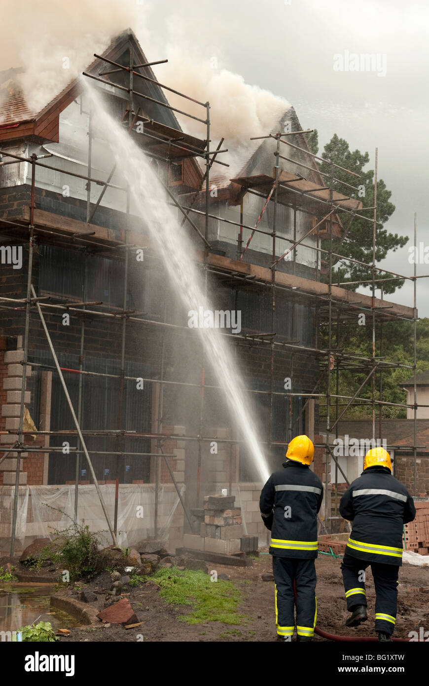 House being built roof on fire Stock Photo Alamy