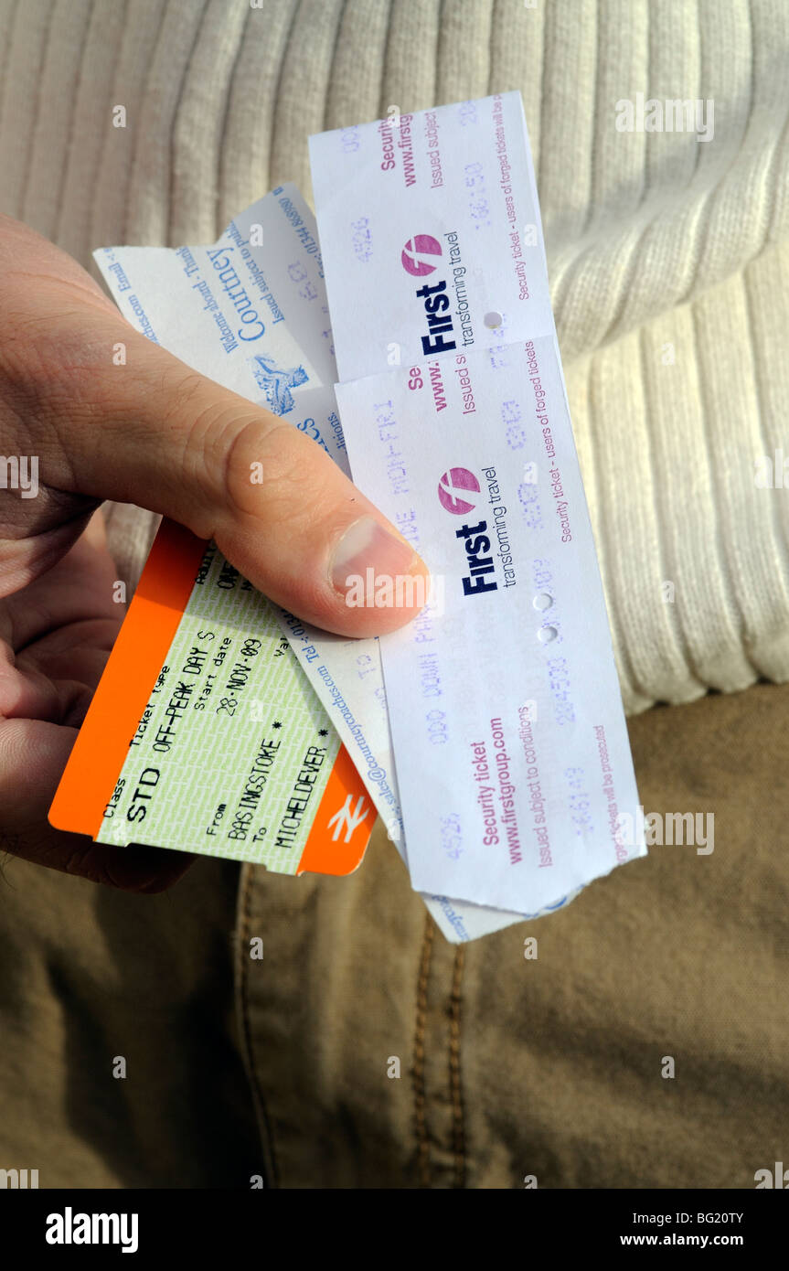 Travel tickets issued for a rail bus and coach traveller Stock Photo