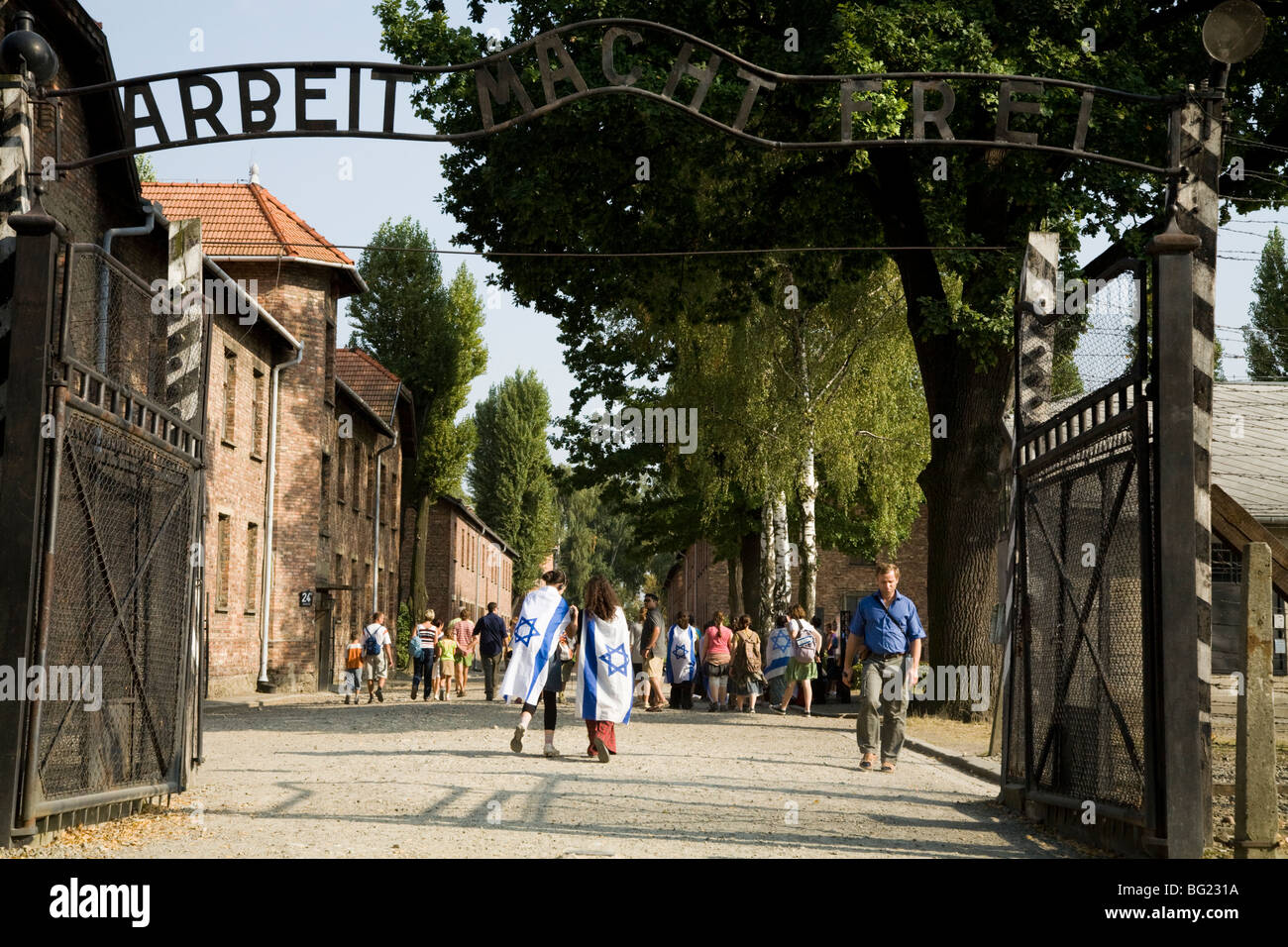 The main entrance – with Arbeit Macht Frei slogan above the gates – at Auschwitz Nazi death camp in Oswiecim, Poland. Stock Photo