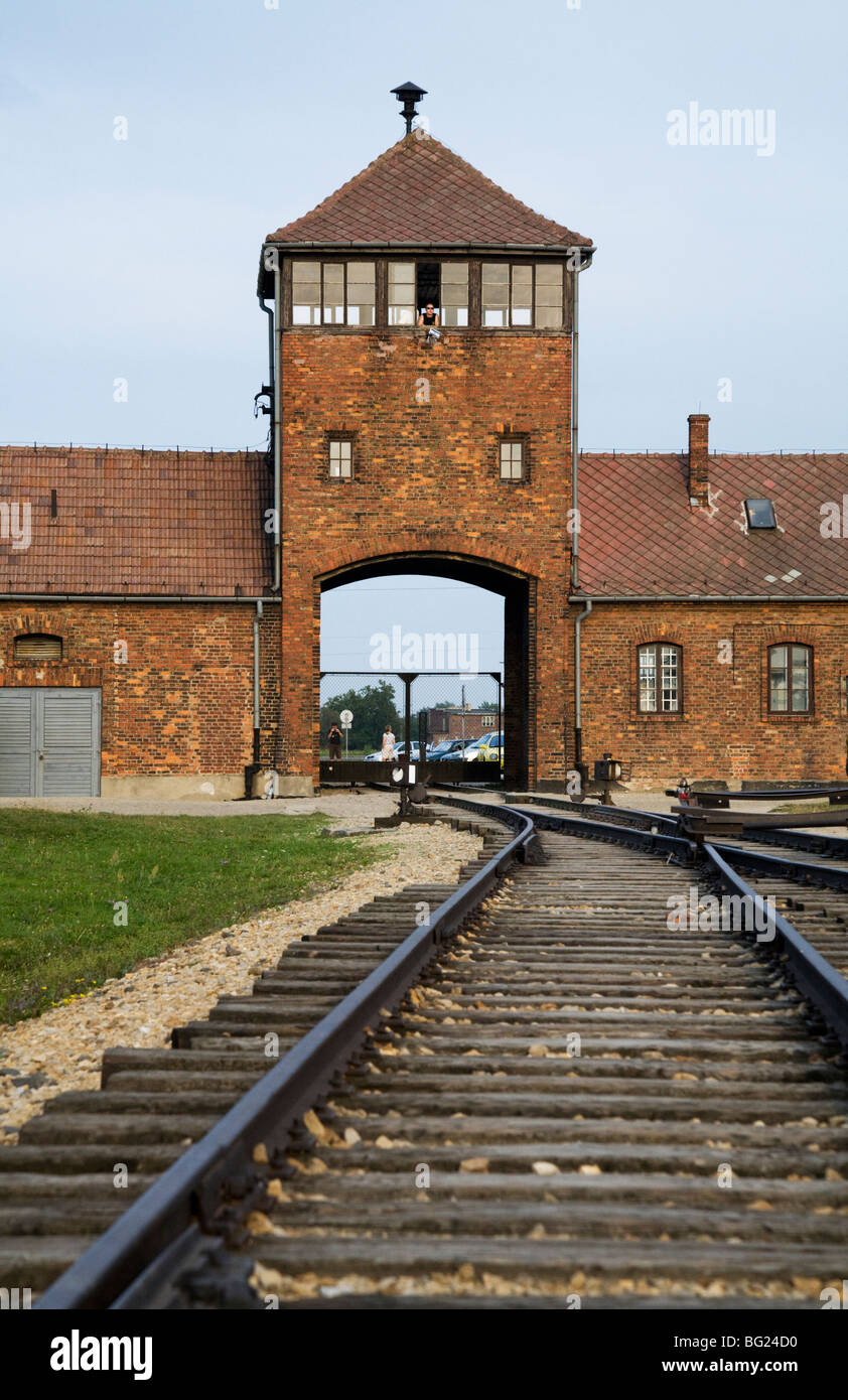 Railway lines leading inside from the main entrance at Birkenau (Auschwitz II - Birkenau) Nazi death camp in Oswiecim, Poland. Stock Photo