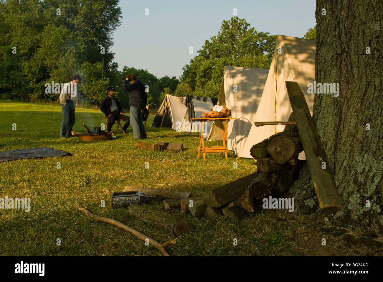 Reenactors portray Union soldiers in camp. Stock Photo