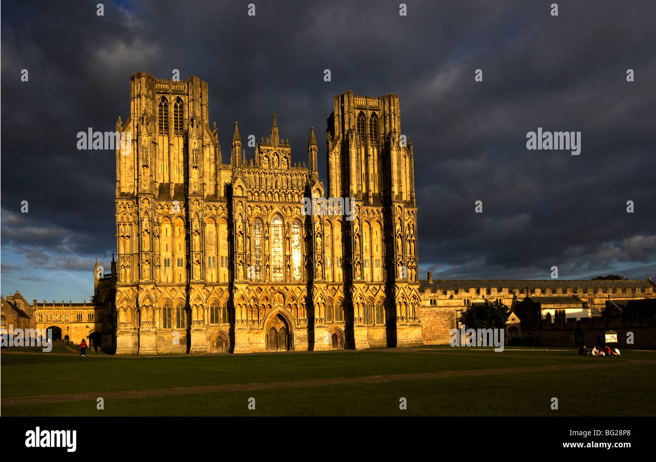 Wells Cathedral showing the stunning West facade with dark cloud formation, Wells, Somerset, England. Stock Photo