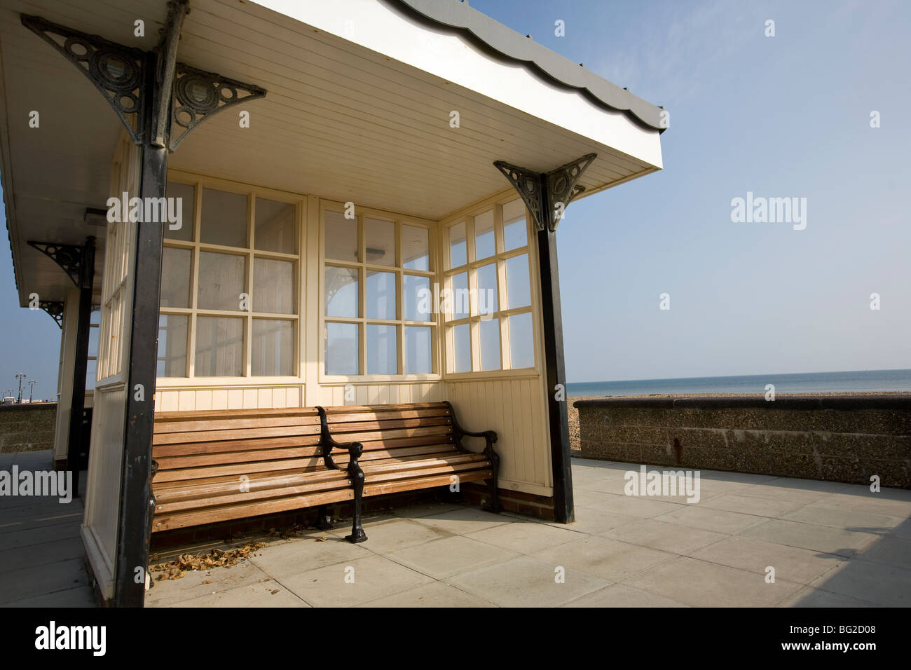 seafront shelter Worthing beach, sheltered seat, South Coast, England Stock Photo