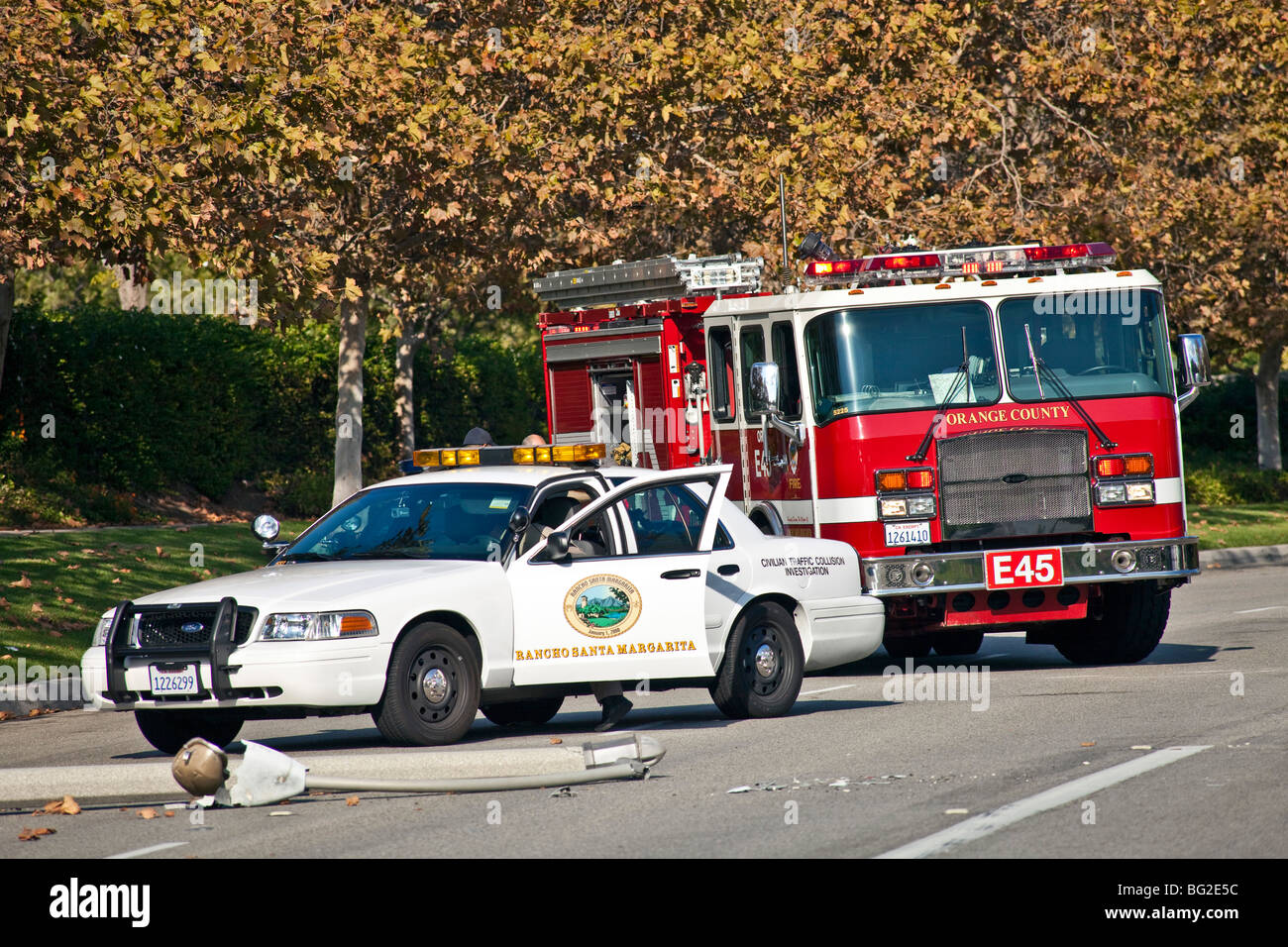 Woman driving Toyota Camry ran into lamppost & then onto an irrigation pump in Rancho Santa Margarita, fire truck CA. © Myrleen Pearson Stock Photo