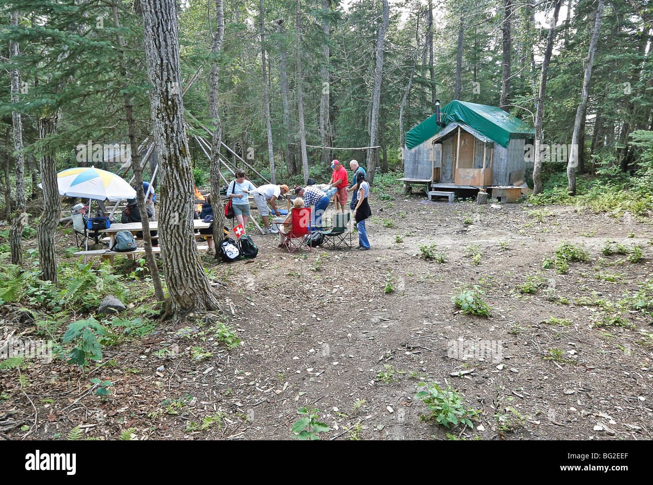 Vistors at Cree Native fish camp along the Moose River, Ont., Canada