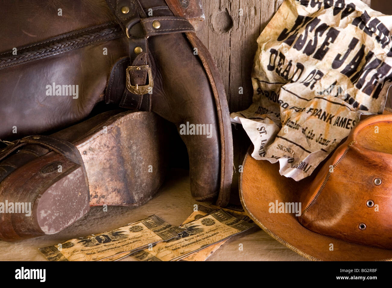 Boots and hat from wild west wanted outlaw Stock Photo