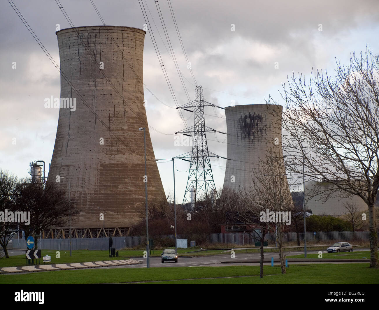 Cooling towers and pylons at the entrance to the Wilton Chemical Plant and Teesside site Power Station at Grangetown Stock Photo