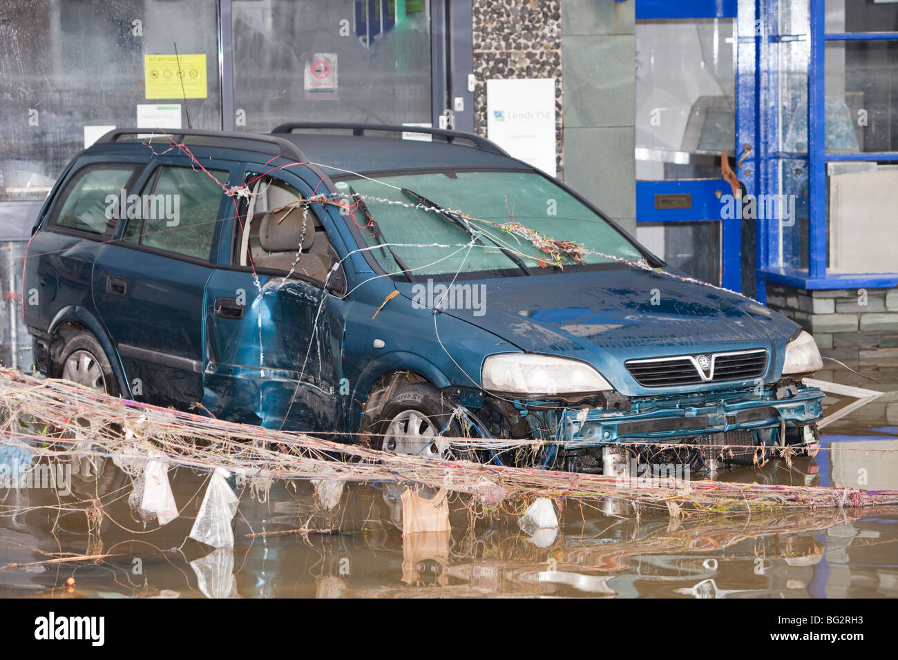 A flooded car on Cockermouth's main street after the devastating November 2009 floods. Stock Photo