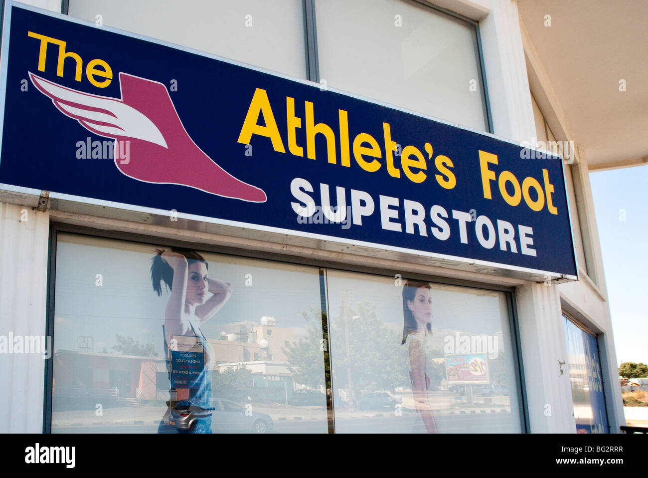 Sign for ‘The Athlete’s Foot’ a humorous misunderstanding of the English meaning of the phrase Stock Photo