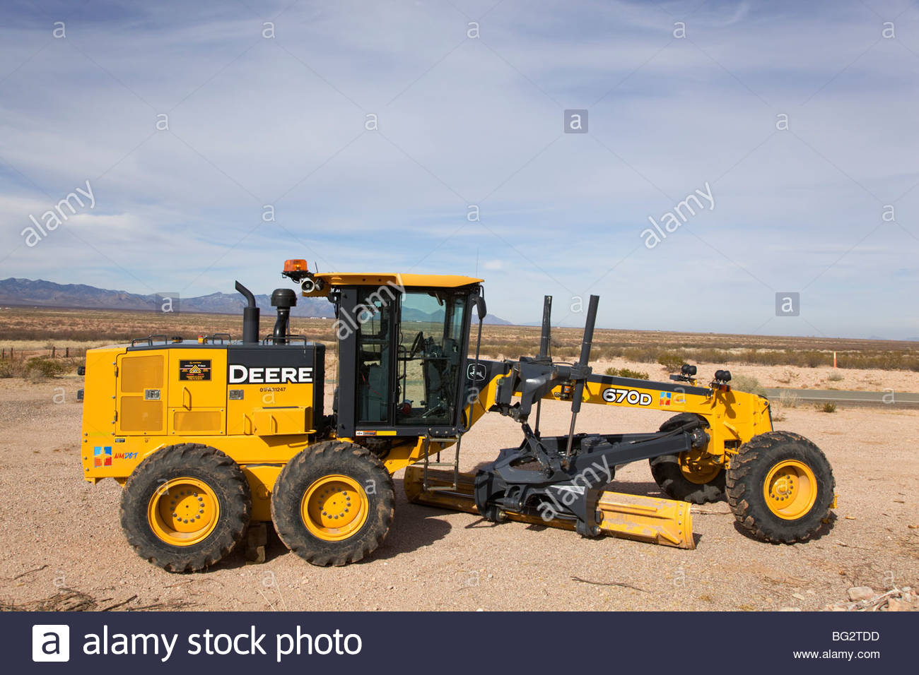 John Deere 670D Motor grader 12 foot blade with scarifier Stock Photo