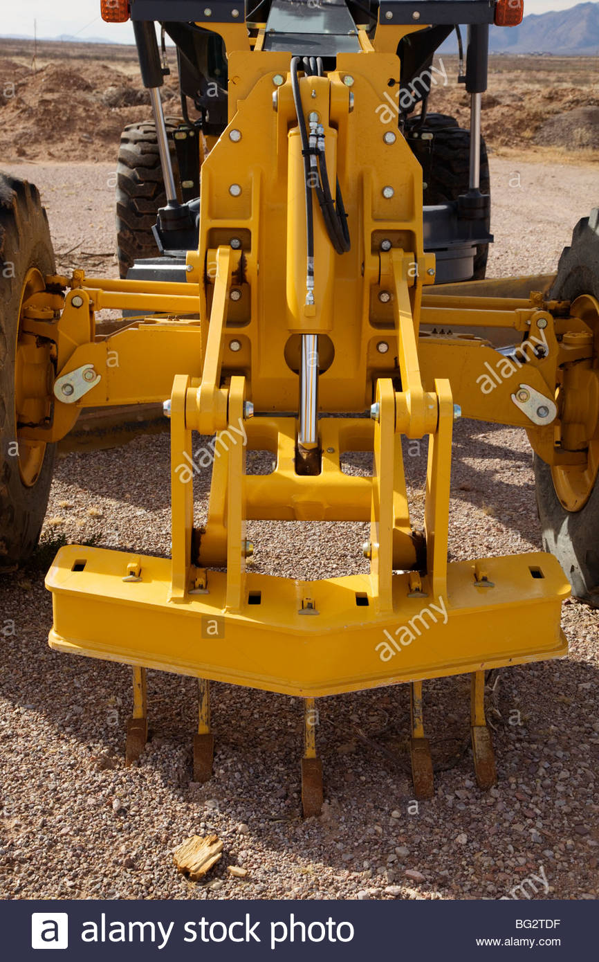 John Deere 670D Motor  grader  detail scarifier Stock Photo 