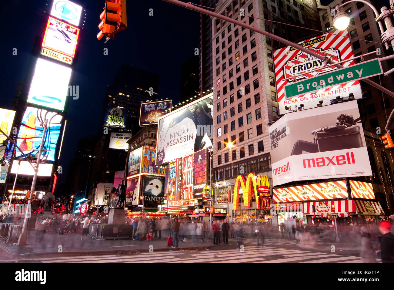 Night scene of Broadway at Times Square in Manhattan (New York City) with all the lit up billboards and advertisements. Stock Photo