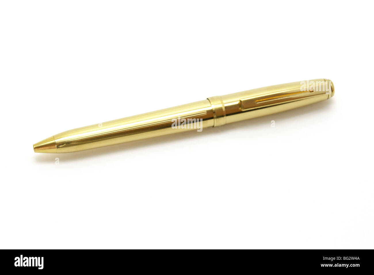 Gold ball point pen isolated on white background Stock Photo