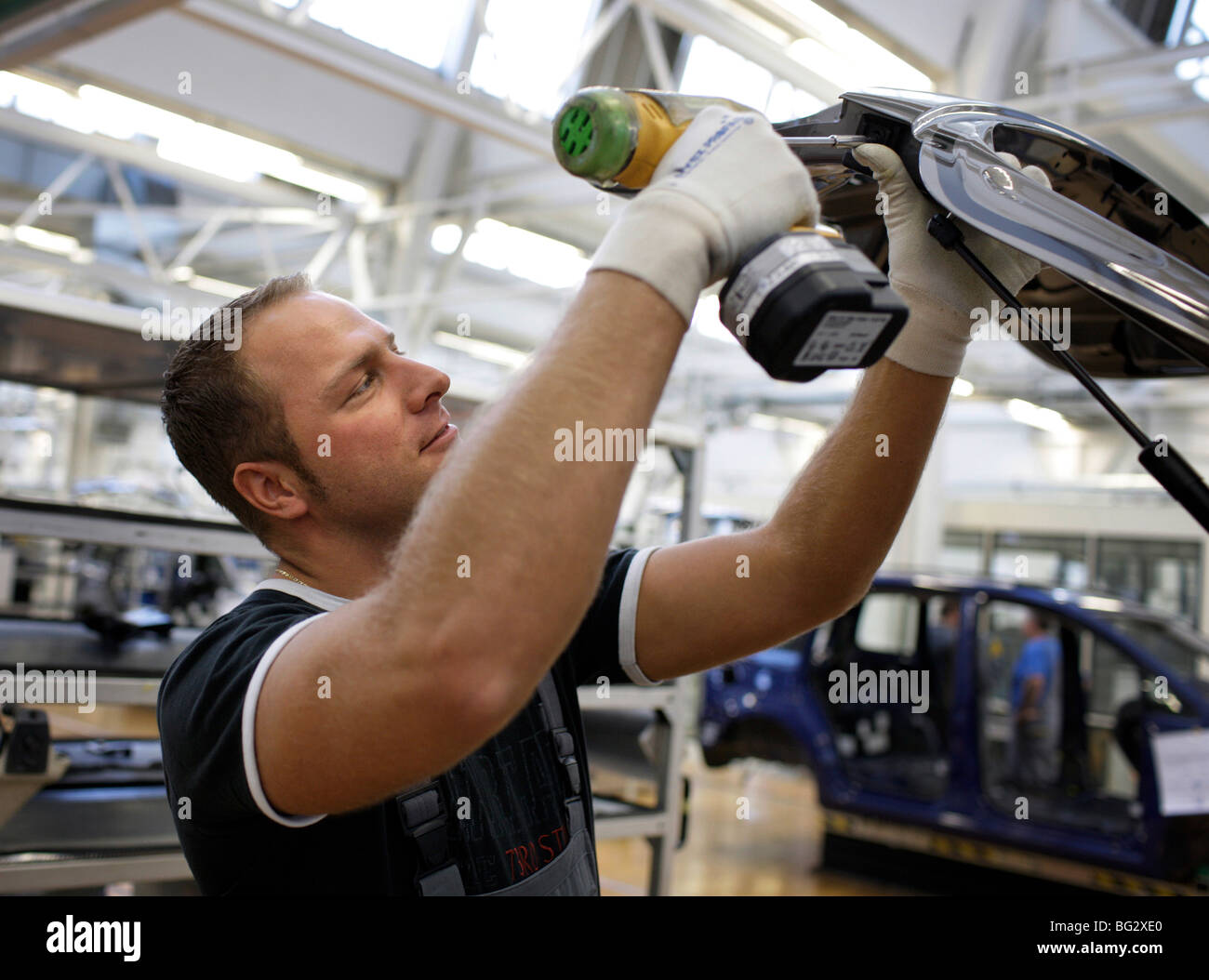 Worker at production of Tiguan and Touran at Auto 5000 Gmbh Stock Photo