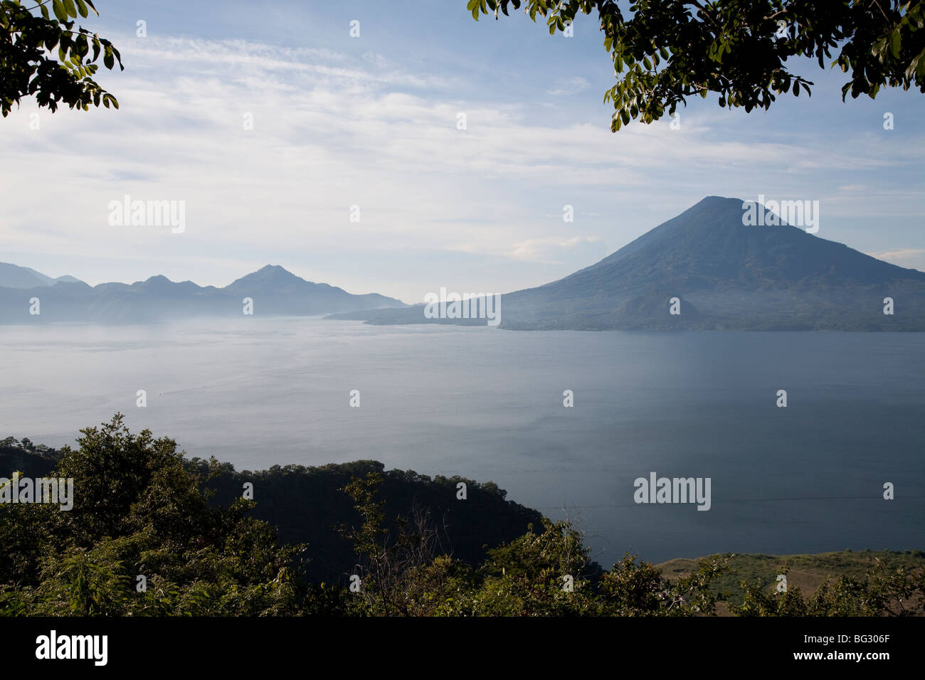 Volcanos San Pedro, Toliman and Atitlan at Lake Atitlan Guatemala. Stock Photo