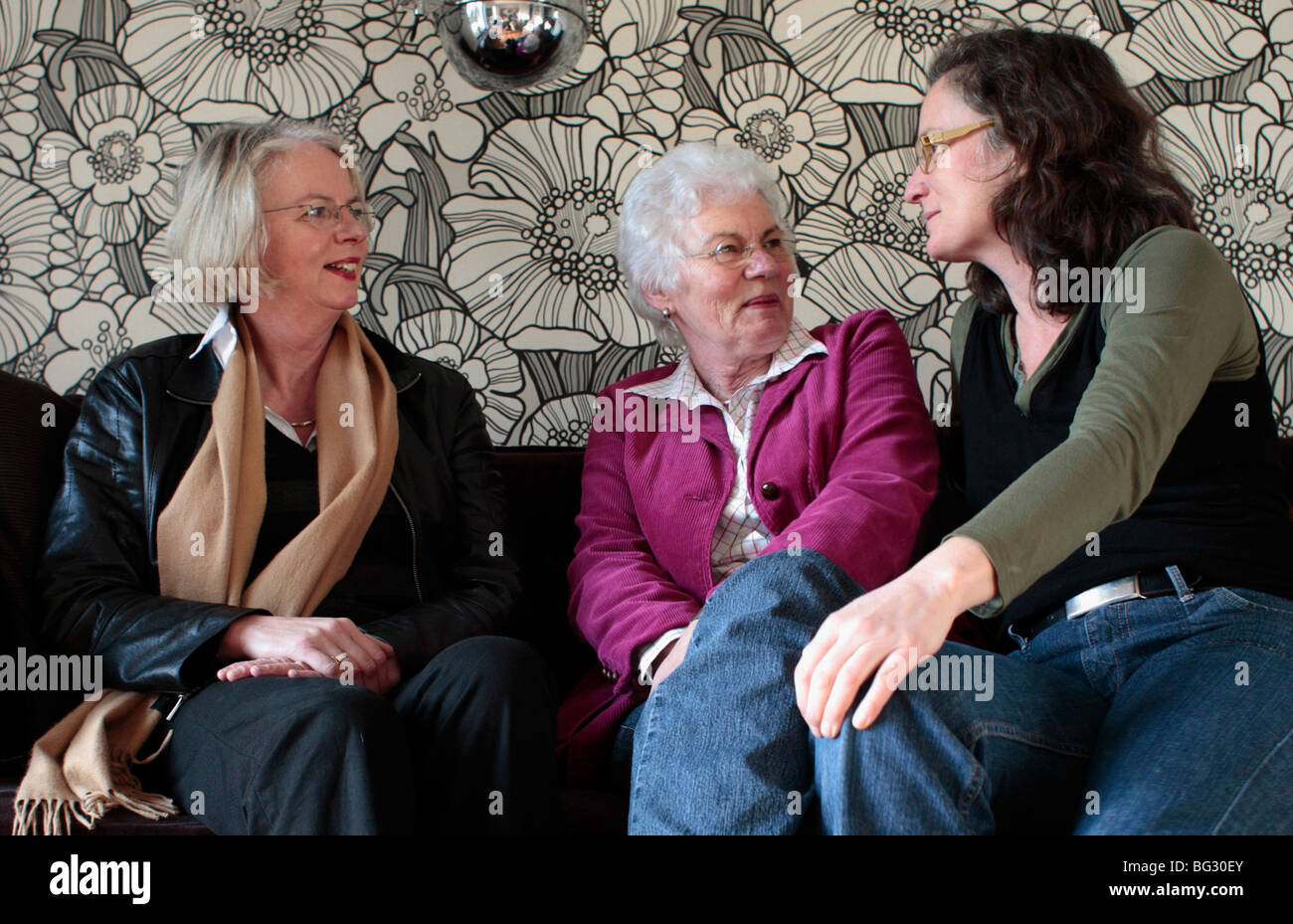 60,70 und 45 years old women talking Stock Photo