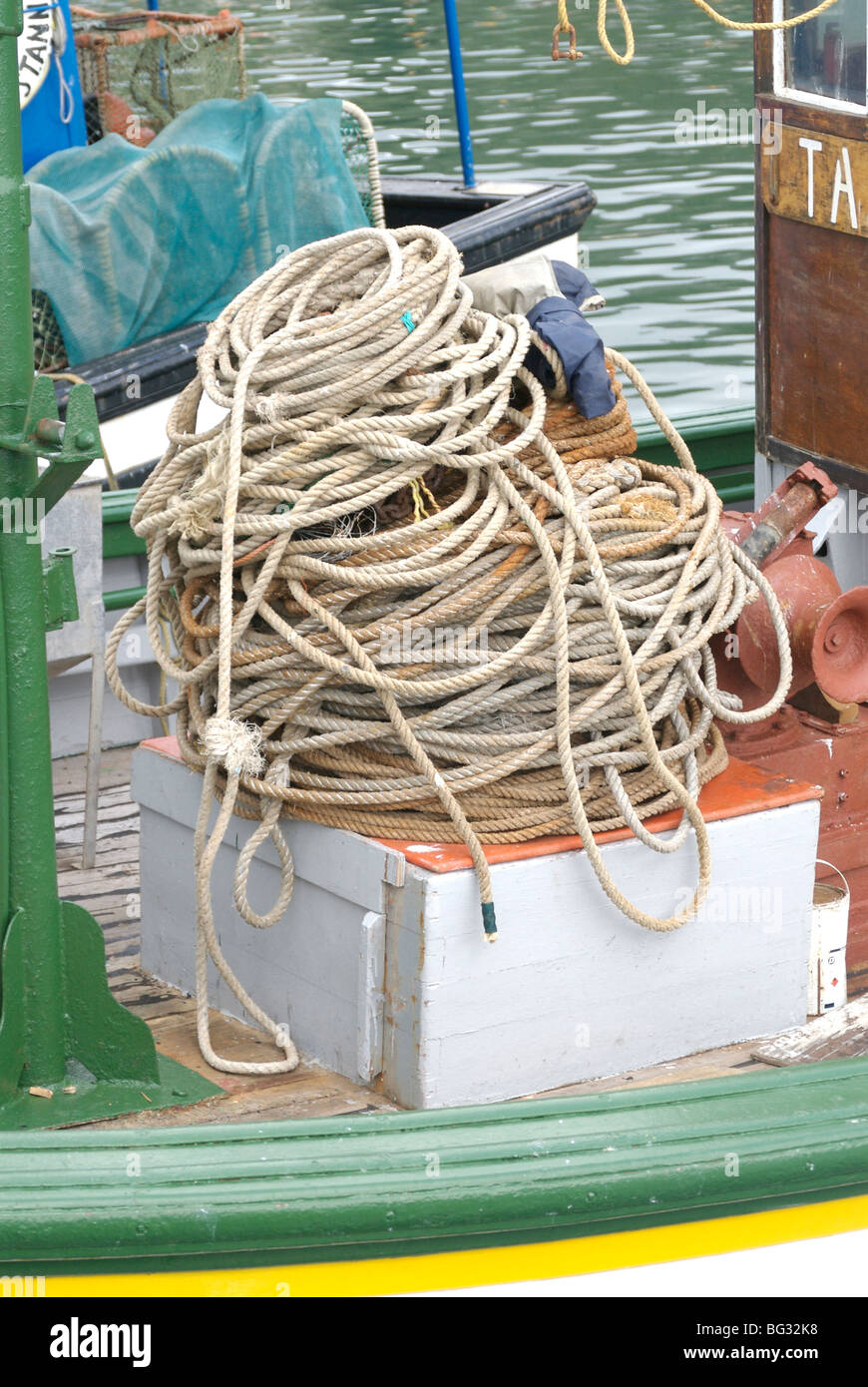 A coil of rope on a fishing boat at Kalk Bay Harbour, Cape Town, South Africa; Stock Photo