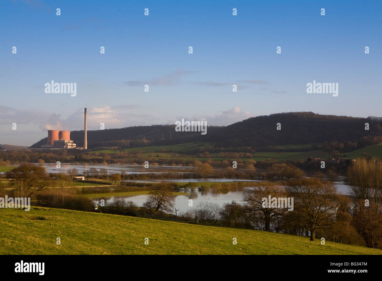 Views of the raising flood water on the river severn towards Ironbridge in Shropshire. Buildwas power station. Stock Photo