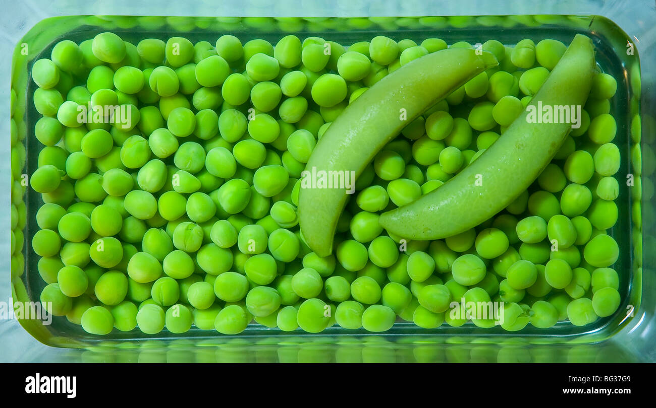 Peas In Pod In Dish Stock Photo