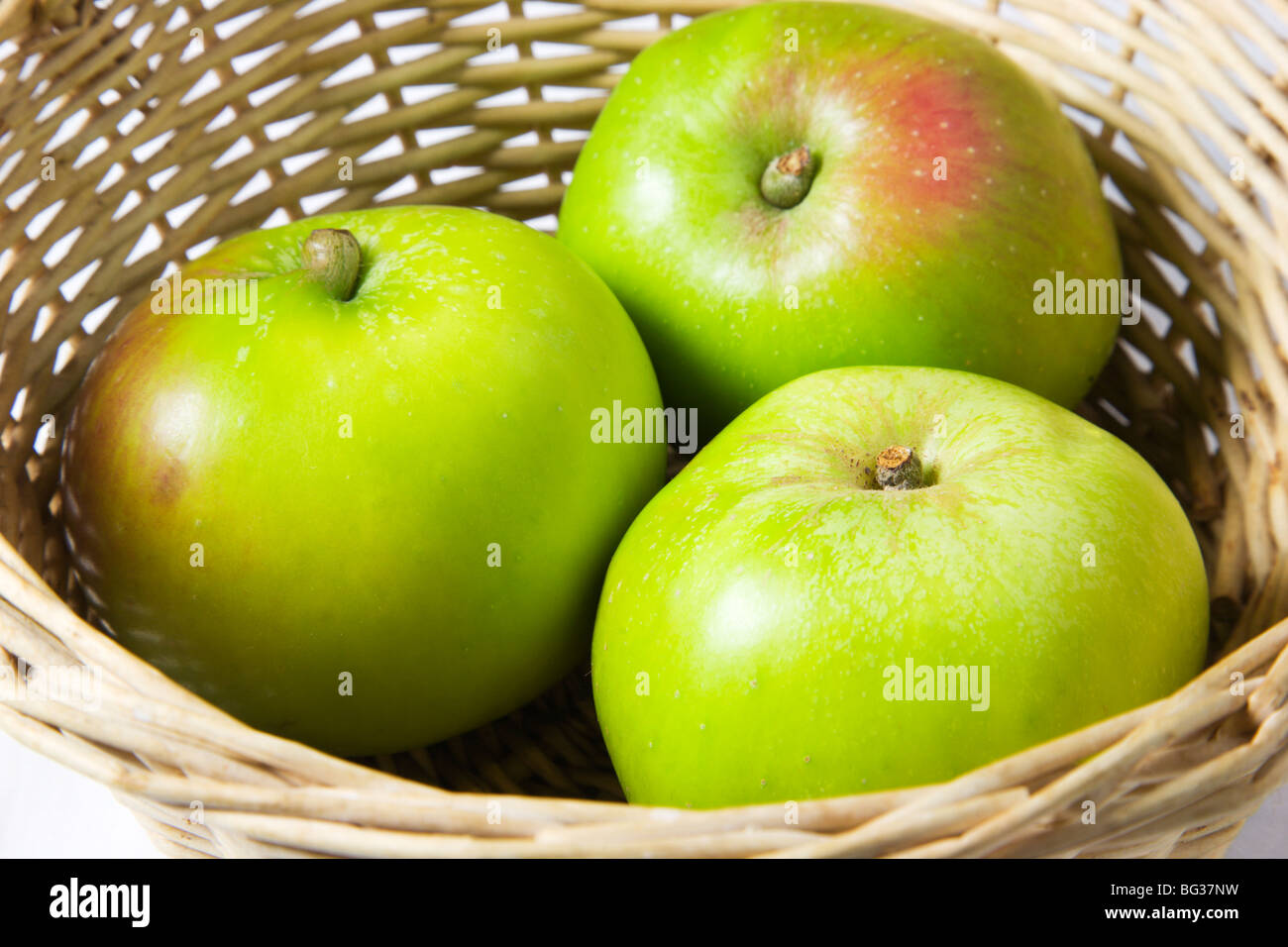 Three Bramley Cooking Apples Stock Photo Alamy
