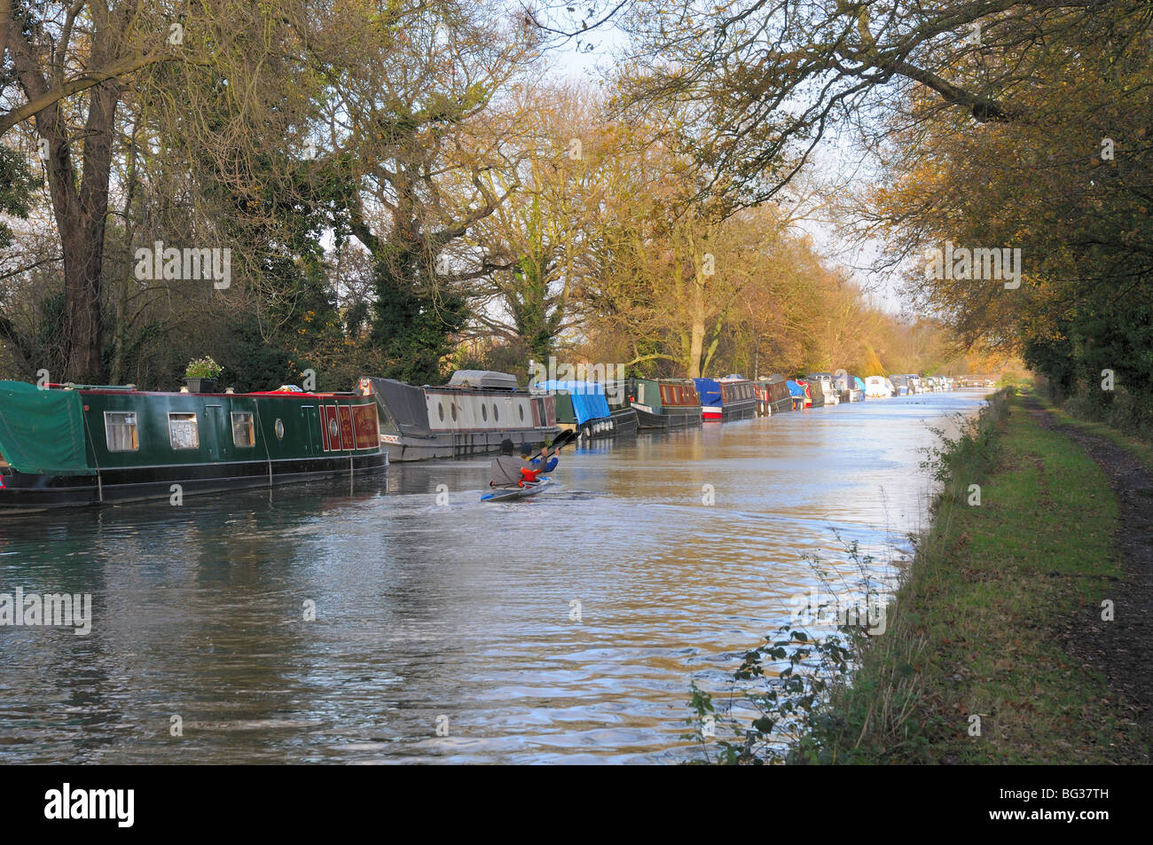 River Wey Navigation with canoeists New Haw Surrey England Stock Photo