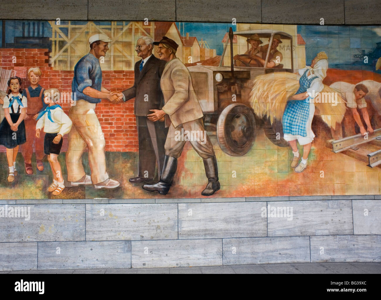 Berlin 2009 Mural Workers Socialism socialist industry soviet mass Finance peace air ministry 1989 DDR Germany Unified positive Stock Photo