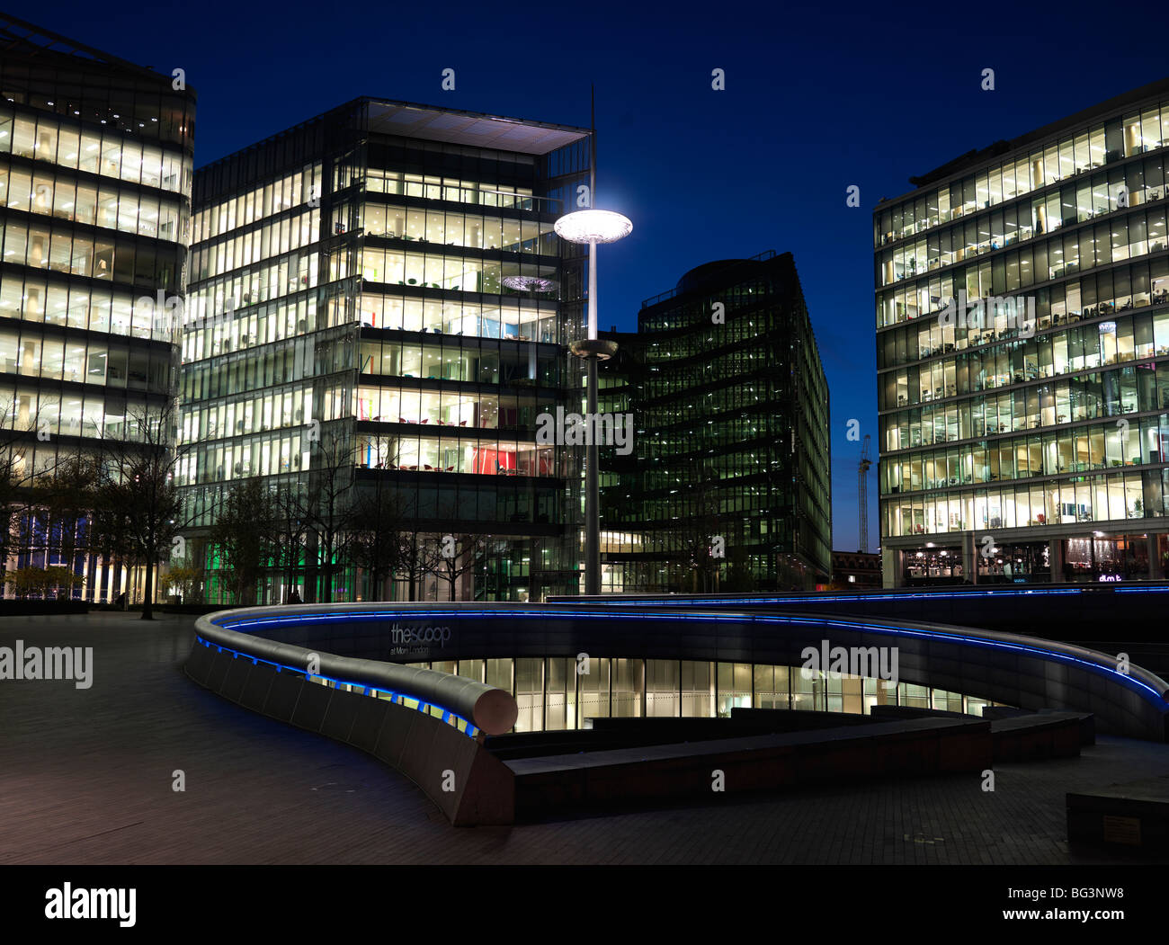 Office Blocks at night near the London Assembly building on the South Bank of the River Thames, London, England. Stock Photo