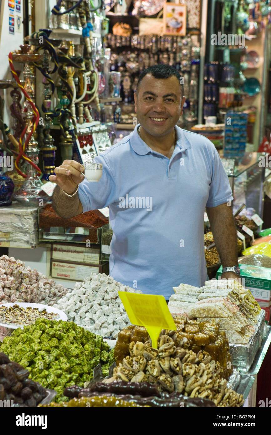 Stallholder with tea, Spice Bazaar, Istanbul, Turkey, Europe Stock Photo
