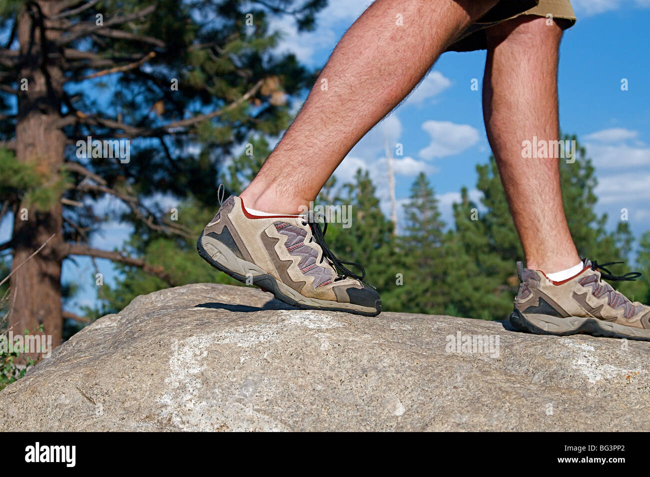 Rugged outdoors mountain scenes with hikers and climbers Stock Photo ...