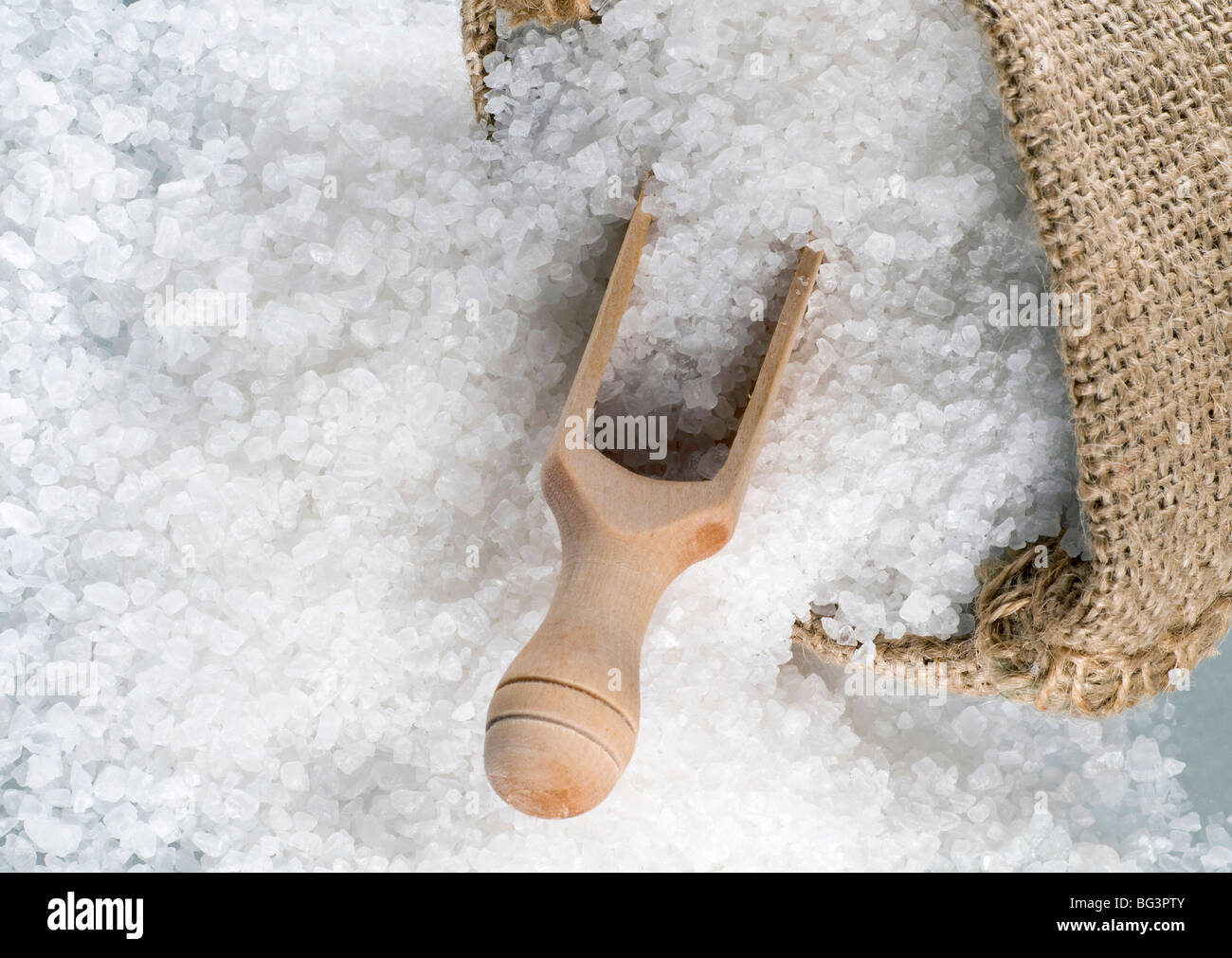 Detail of sea salt in a burlap sack Stock Photo