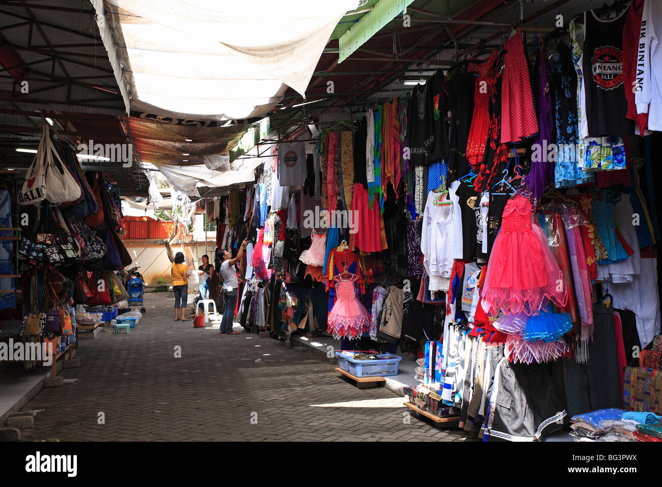 market stalls selling clothing, bags and homewares in a gang (alleyway